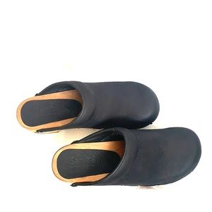 Sanita clogs. NWOT. Wooden sole. Leather upper.